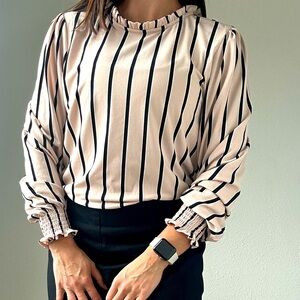 Blush pink with black stripe blouse - great for the corporate world!